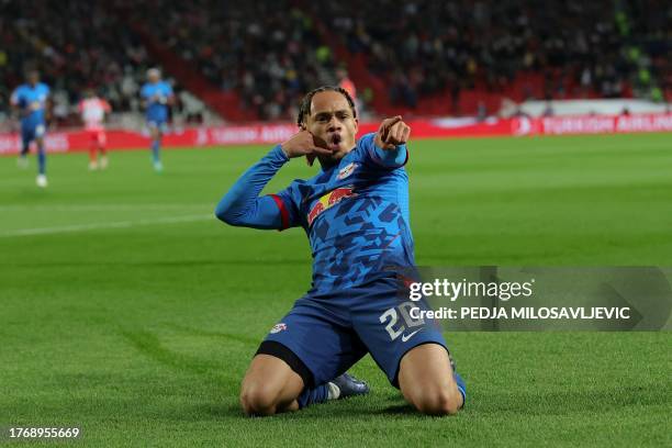 Leipzig's Dutch midfielder Xavi Simons celebrates scoring Leipzig's first goal during the UEFA Champions League Group G football match between FC...