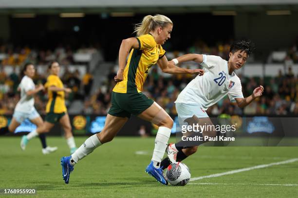 Charlotte Grant of Australia controls the ball during the AFC Women's Asian Olympic Qualifier match between Australia and Chinese Taipei at HBF Park...