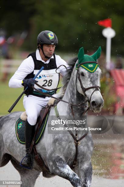 Marcio Carvalho Jorge of Brazil riding Castle Howard Casanova on the cross country course during the Three day eventing competition at the Pan-Am...