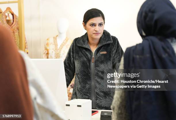 Farah Talib Aziz manager Sarah Khawaja listens to a customer at the Sugar Land Town Square store on Tuesday, Oct. 31, 2023. A new ranking puts Sugar...