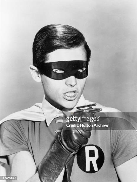 Promotional portrait of American actor Burt Ward in costume as Robin for the television program, 'Batman,' c. 1966.