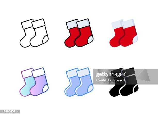 socks icon. 6 different styles. editable stroke. - knitted socks stock illustrations