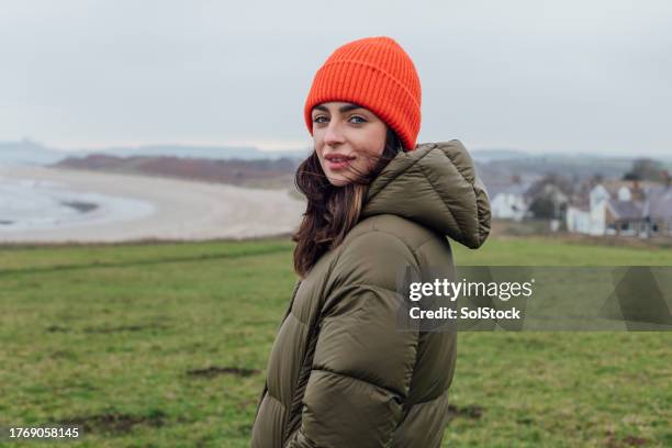 coastal enjoyment - padded jacket stock pictures, royalty-free photos & images