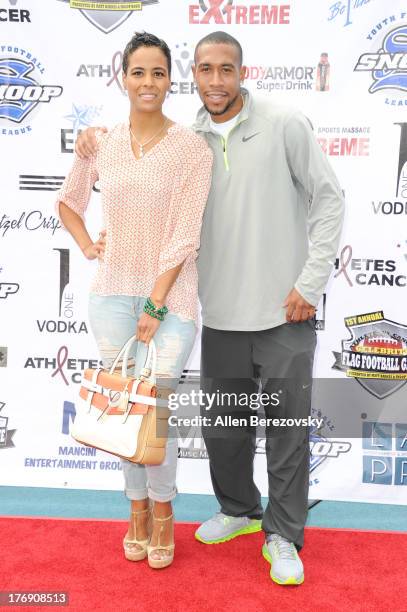 Personality Daphne Wayans and olympic sprinter Bryshon Nellum attend the 1st Annual Athletes VS Cancer Celebrity Flag Football Game on August 18,...