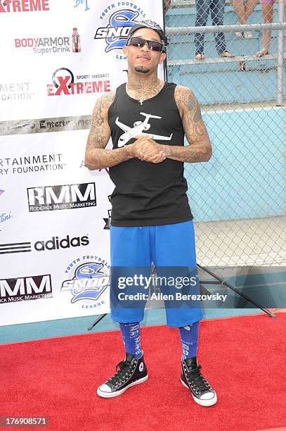 Recording artist Mac Lucci attends the 1st Annual Athletes VS Cancer Celebrity Flag Football Game on August 18, 2013 in Pacific Palisades, California.