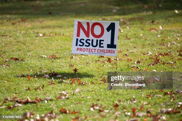 An Issue 1 campaign sign outside a polling location in Toledo, Ohio, US, on Tuesday, Nov. 7, 2023. Ohioans are considering a proposed amendment,...