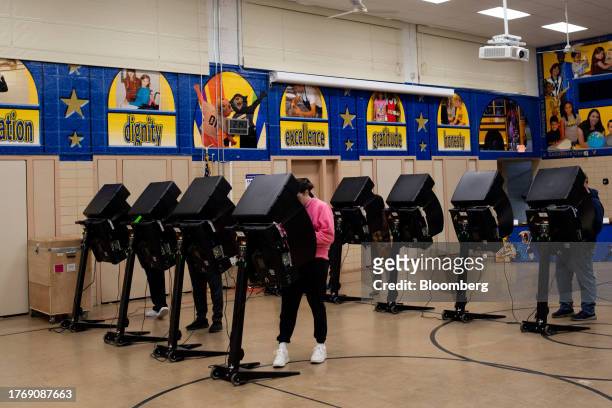 Voters cast their ballots at a polling location in Toledo, Ohio, US, on Tuesday, Nov. 7, 2023. Ohioans are considering a proposed amendment, called...