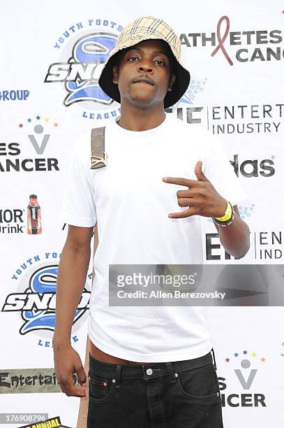 Rapper Pilot attends the 1st Annual Athletes VS Cancer Celebrity Flag Football Game on August 18, 2013 in Pacific Palisades, California.