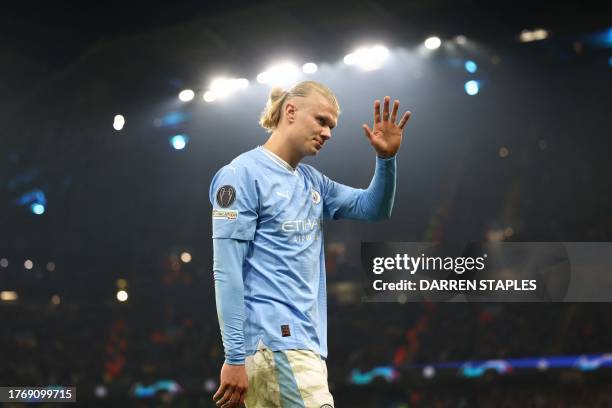 Manchester City's Norwegian striker Erling Haaland is substituted during the UEFA Champions League Group B second leg football match between...