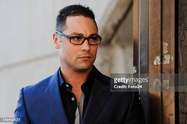 Carl Pistorius, Oscar's brother, arrives at the Pretoria Magistrates court on August 19 in Pretoria, South Africa. Oscar Pistorius is accused of the...