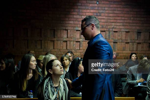 Carl and Aimme Pistorius in the Pretoria Magistrates court on August 19 in Pretoria, South Africa. Pistorius is accused of the murder of Reeva...