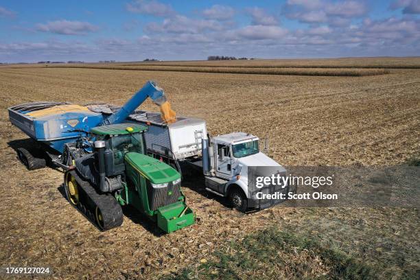 An aerial view shows workers from Pinicon Farm harvesting corn on October 31, 2023 near McIntire, Iowa. With more than 75% of the state’s corn...