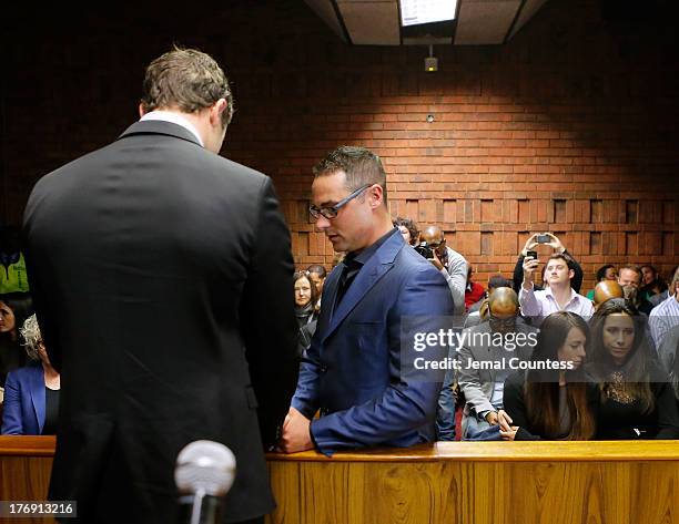 South African athlete Oscar Pistorius appears in Pretoria Magistrates Court for an indictment hearing on August 19, 2013 in Pretoria, South Africa.Ê...