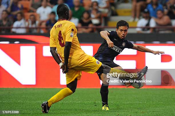 Yuto Nagatomo of FC Internazionale Milano in action against Mohamed Coly of AS Cittadella during the TIM cup match between FC Internazionale Milano...