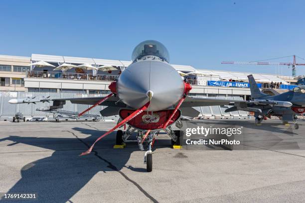 Direct view of the cockpit with the famous bubble canopy of General Dynamics F-16 fighter jet on the tarmac at the static display during the...