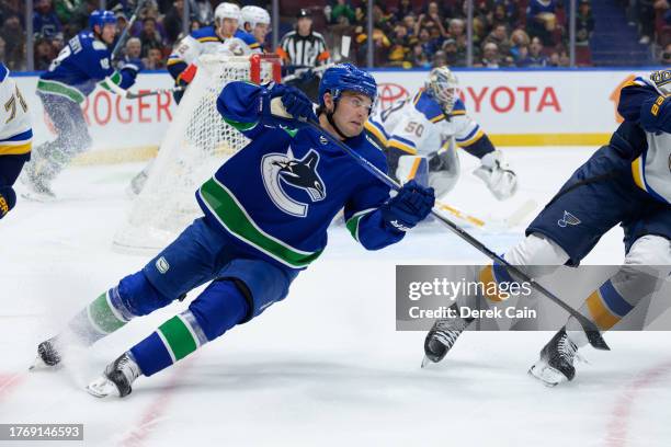 Nils Hoglander of the Vancouver Canucks skates during the first period of their NHL game against the St. Louis Blues at Rogers Arena on October 27,...