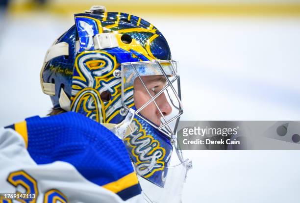 Joel Hofer of the St. Louis Blues looks on during warm-up prior to their NHL game against the Vancouver Canucks at Rogers Arena on October 27, 2023...