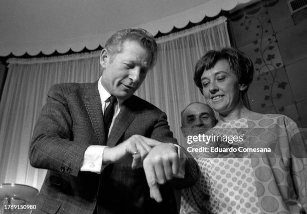 American actor and dancer Danny Kaye checks his watch during a press conference at the Buenos Aires Plaza Hotel, Buenos Aires, Argentina, 1967.