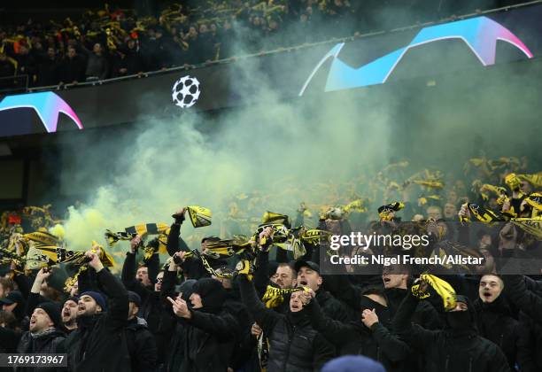 Young Boys fans with scarves before the UEFA Champions League match between Manchester City and BSC Young Boys at Etihad Stadium on November 7, 2023...