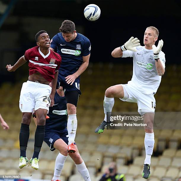 Ivan Toney of Northampton Town contests the ball with Ryan Leonard and Goalkeeper Daniel Bentley of Southend United during the Sky Bet League Two...