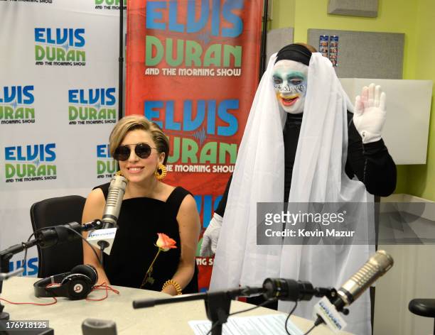 Lady Gaga and Greg T. At "Elvis Duran and the Z100 Morning Show" at Z100 Studio on August 19, 2013 in New York City.