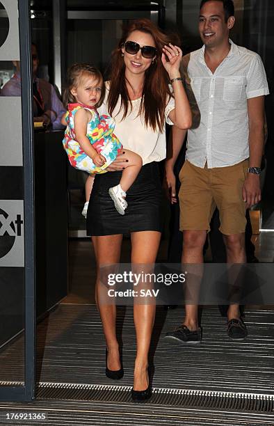 Una Healy of The Saturdays pictured with her daughter at BBC Radio 1 on August 19, 2013 in London, England.