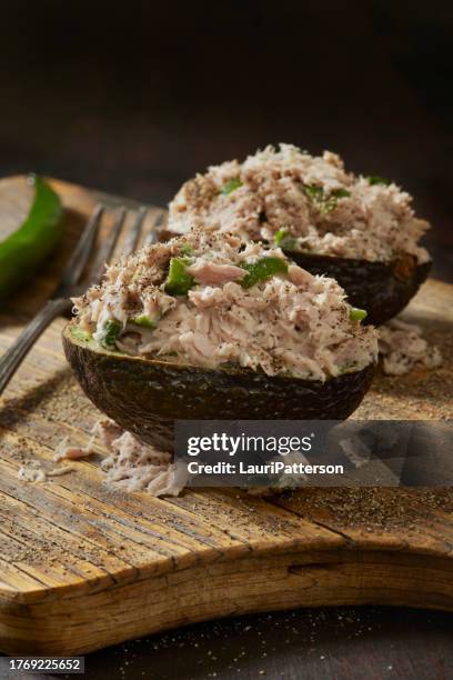 avocado tuna salad boats - stuffed avocado stock pictures, royalty-free photos & images