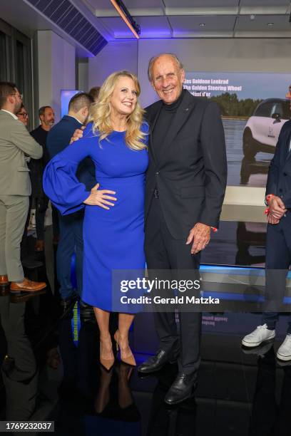 Barbara Schöneberger and Hans-Joachim Stuck attend the "Das Goldene Lenkrad" Award 2023 at Axel Springer Haus on November 7, 2023 in Berlin, Germany.