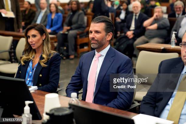 Donald Trump Jr. Sits in a New York courtroom as lawyer Alina Habba listens on November 01, 2023 in New York City. Trump's children, Donald Jr.,...