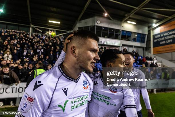 Bolton Wanderers' Aaron Morley celebrates scoring his side's second goal with team mates during the Sky Bet League One match between Shrewsbury Town...