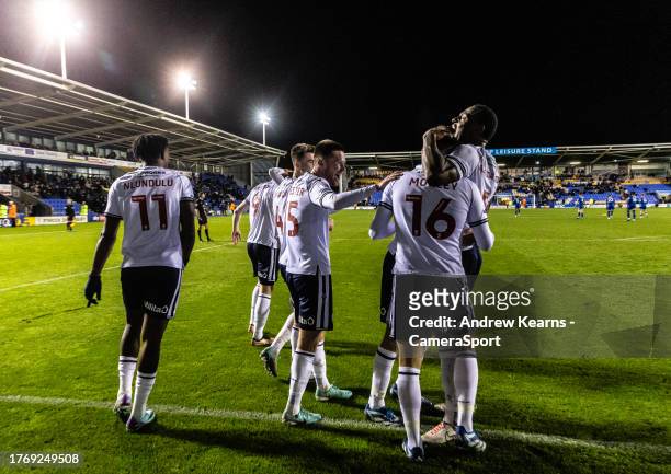 Bolton Wanderers' Aaron Morley celebrates scoring his side's second goal with team mates during the Sky Bet League One match between Shrewsbury Town...