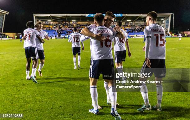 Bolton Wanderers' Aaron Morley celebrates scoring his side's second goal with team mates during the Sky Bet League One match between Shrewsbury Town...