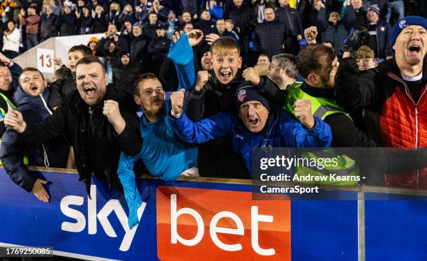 Bolton Wanderers supporters celebrate victory at the end of the match during the Sky Bet League One match between Shrewsbury Town and Bolton...