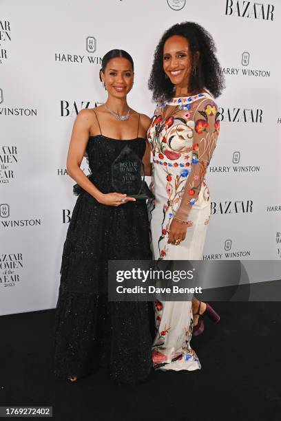 Gugu Mbatha-Raw, winner of the Philanthropist award, and Afua Hirsch pose at the Harper's Bazaar Women of the Year Awards 2023 at Claridge's Hotel on...