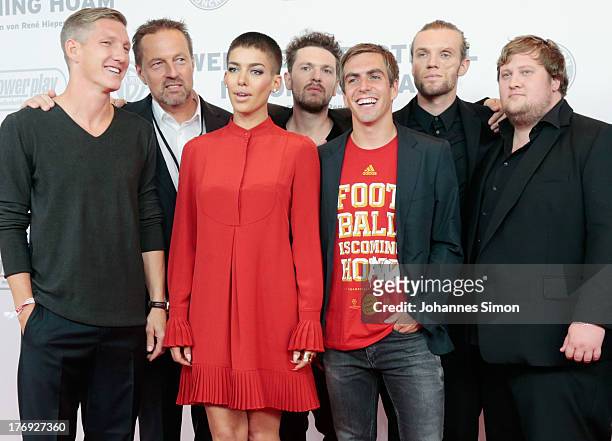 Bastian Schweinsteiger, Rene Hiepen, Alina Sueggeler, Philipp Lahm and members of the band 'Frida Gold' arrive for the Wembley: Football Is Coming...