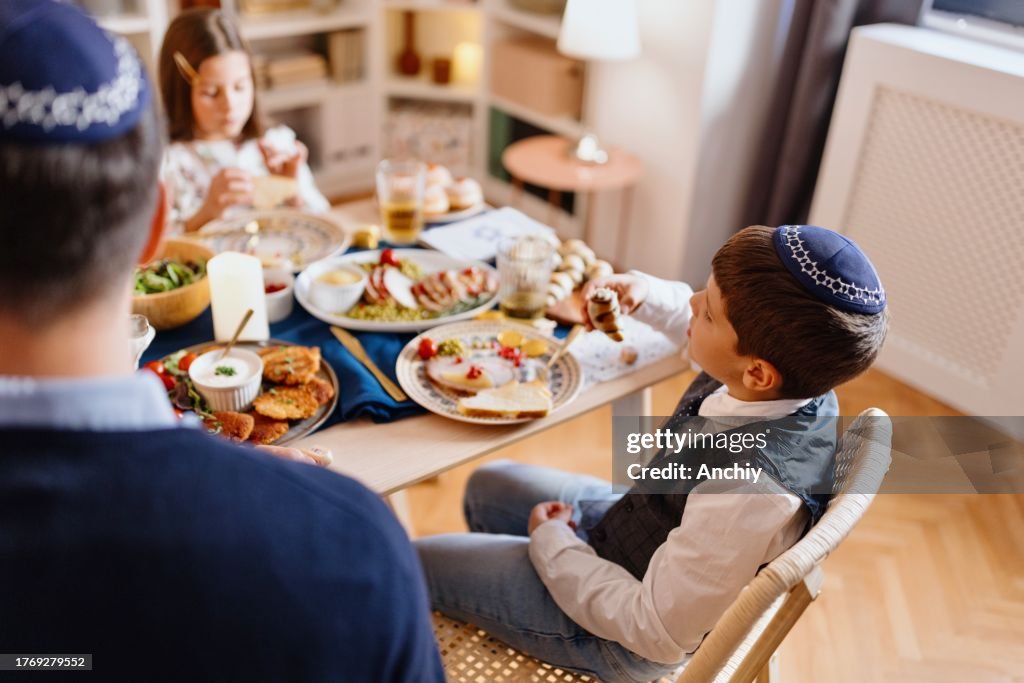 Little boy eating Rugelach