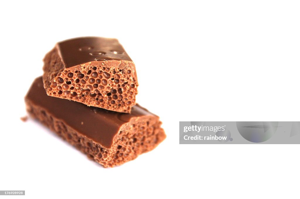 Chocolate with bubbles on white background