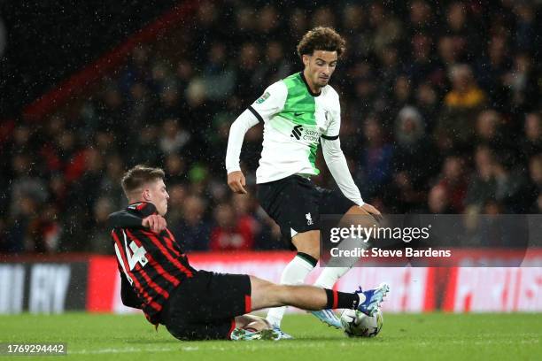 Curtis Jones of Liverpool is tackled by Alex Scott of AFC Bournemouth during the Carabao Cup Fourth Round match between AFC Bournemouth and Liverpool...