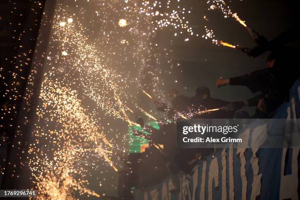 Fans let off flares during the DFB cup second round match between 1. FC Saarbrücken and FC Bayern München at Ludwigsparkstadion on November 01, 2023...