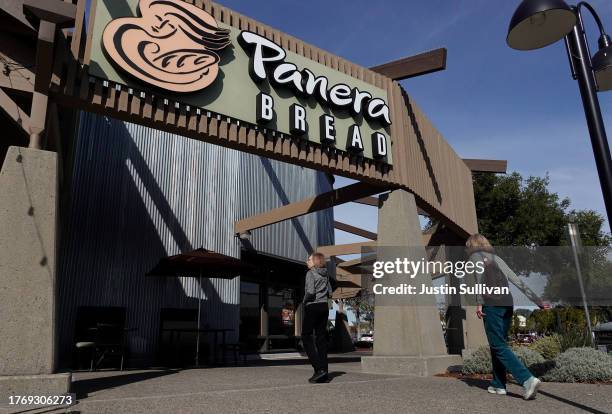 Customers enter a Panera Bread restaurant on November 01, 2023 in Novato, California. Missouri based Panera Bread announced plans to lay off 17...