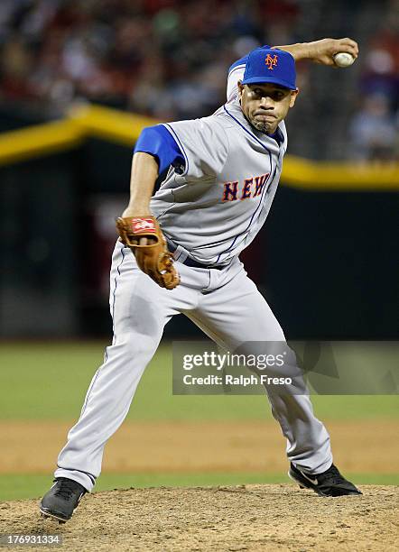 Pitcher Pedro Feliciano of the New York Mets delivers a pitch against the Arizona Diamondbacks during a MLB game at Chase Field on August 10, 2013 in...