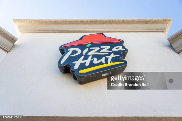 Pizza Hut store is seen on November 01, 2023 in Austin, Texas. Pizza Hut's third-quarter revenue fell short of analysts' expectations for same-store...