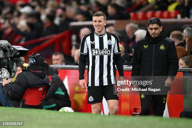 Matt Targett of Newcastle United reacts after leaving the pitch injured during the Carabao Cup Fourth Round match between Manchester United and...