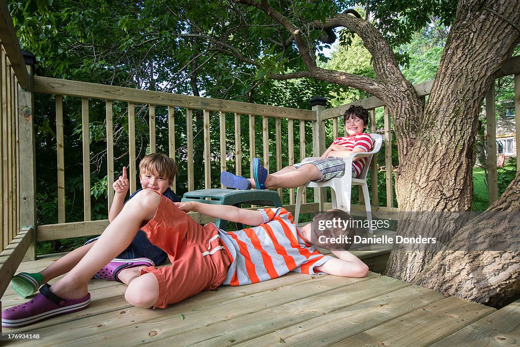 Three boys in a treehouse