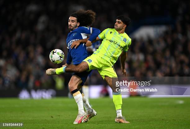 Marc Cucurella of Chelsea is challenged by Dilan Markanday of Blackburn Rovers during the Carabao Cup Fourth Round match between Chelsea and...
