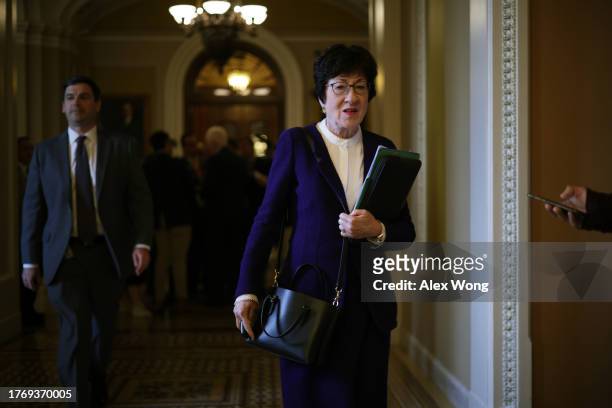 Sen. Susan Collins passes through a hallway at the U.S. Capitol on November 1, 2023 in Washington, DC. Lawmakers continued to work on the Hill after...