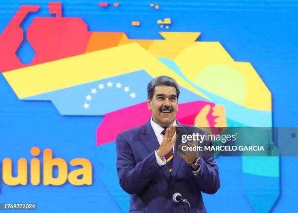 This handout picture released by the Venezuelan Presidency shows Venezuela's President Nicolas Maduro during a meeting at the Teresa Carreno theater...