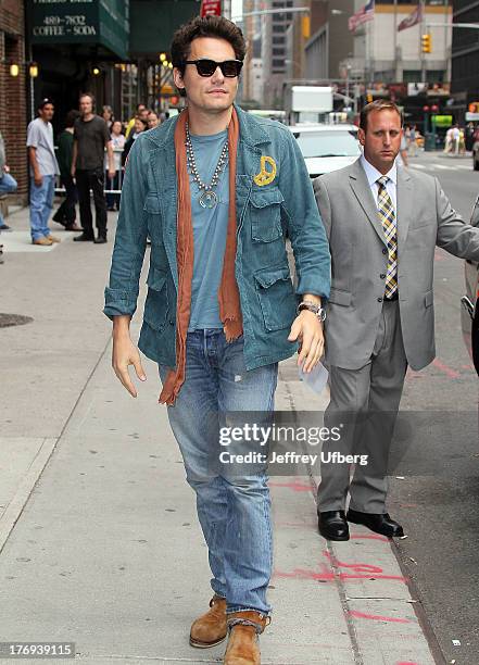 Musician John Mayer arrives to "Late Show with David Letterman" at Ed Sullivan Theater on August 19, 2013 in New York City.