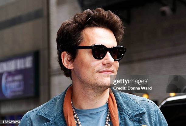 August 19: John Mayer arrives for the "Late Show with David Letterman" at Ed Sullivan Theater on August 19, 2013 in New York City.