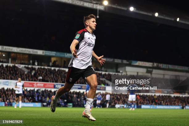 Tom Cairney of Fulham celebrates after scoring their sides third goal during the Carabao Cup Fourth Round match between Ipswich Town v Fulham at...